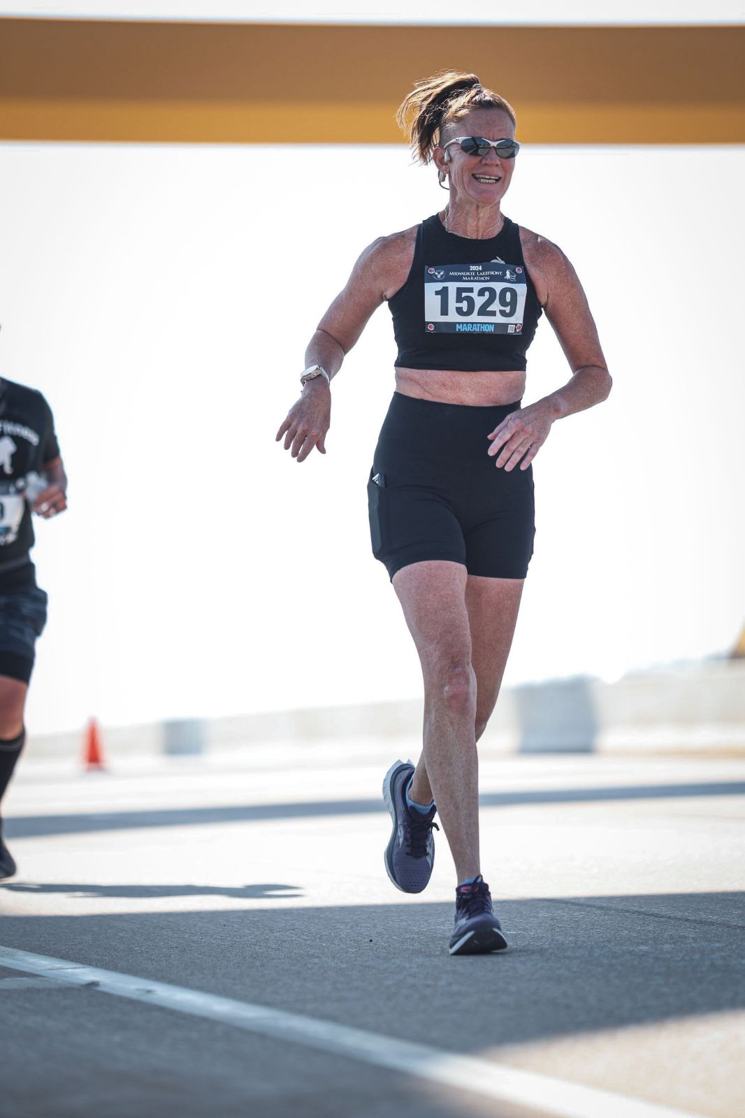 Foundational Fitness strength and conditioning coach runs her second marathon with a smile